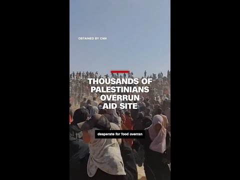 Thousands of Palestinians overrun US-backed aid site
