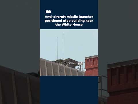 Anti-aircraft missile launcher positioned atop building near the White House