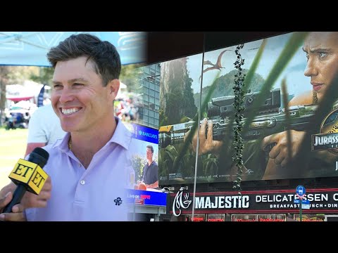 Colin Jost Reacts to Viral Billboard of Wife Scarlett Johansson SHOOTING HIM