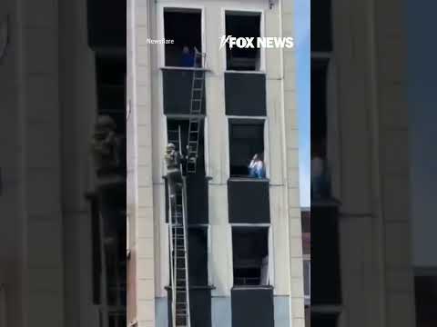 Jarring video shows Russian firefighter plummet from building #shorts #news #us #foxnews