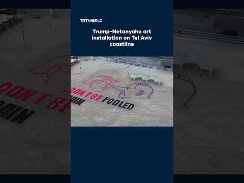 “Don’t Be Fooled Again”: Trump–Netanyahu art installation on Tel Aviv coastline