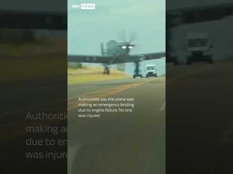 Moment US military plane nearly hits car