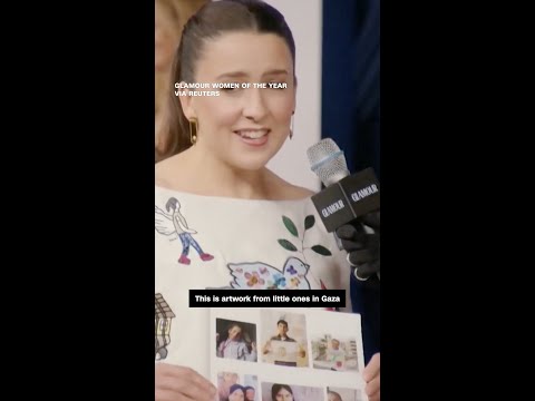 Ms. Rachel wears dress with children’s artwork from Gaza