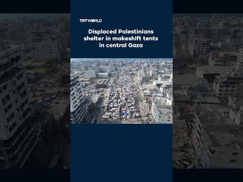 Displaced Palestinians shelter in makeshift tents in central Gaza