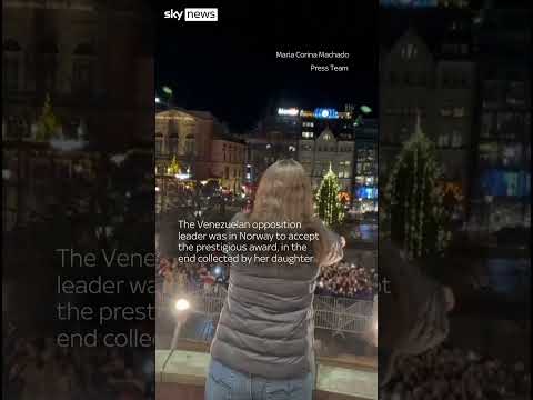 Venezuela’s opposition leader greets crowd