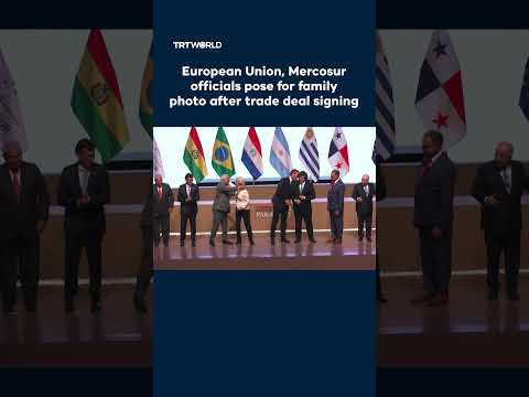 European Union, Mercosur officials pose for family photo after trade deal signing
