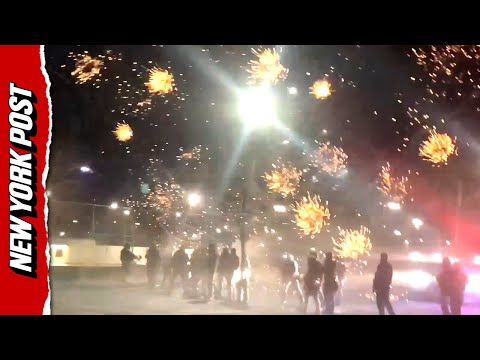 Fireworks and Teargas as Anti-ICE Protesters Clash With Police Outside Federal Building