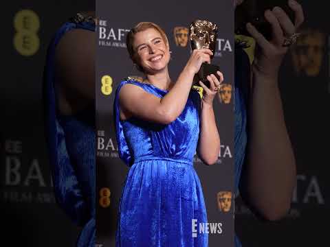 Jessie Buckley looks at her Leading Actress Award at the #BAFTAs. ❤️ #AwardsSeason