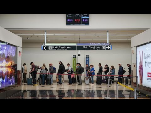 Airport delays escalate as lawmakers feud over DHS funding