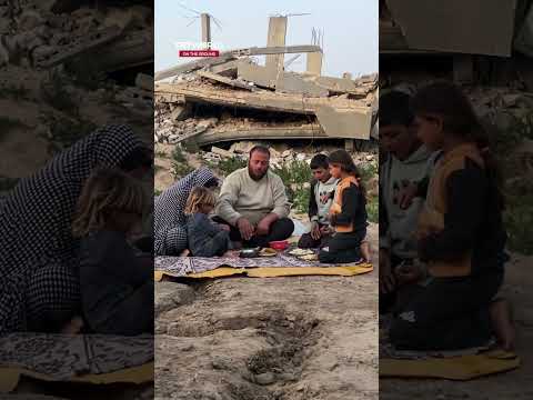 Palestinian family holds iftar outside destroyed home