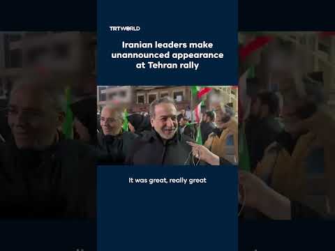 Iranian leaders make unannounced appearance at massive Tehran rally