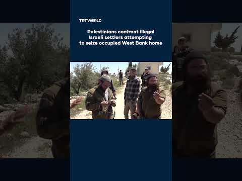 Palestinians confront illegal Israeli settlers attempting to seize occupied West Bank home