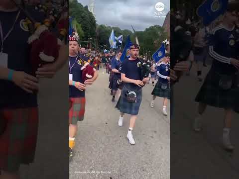 Duck wearing Scottish flag leads march through Rhode Island