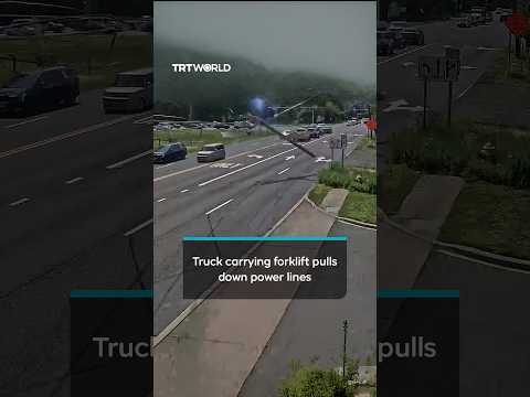 Semi-truck carrying tall load pulls down power lines in New Jersey