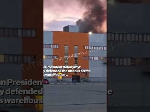 Videographer Sent FLYING After Ukrainian Kamikaze Drone Blasts Into Wildberries Warehouse #shorts