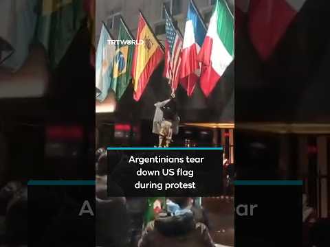 Argentinians tear down US flag during protest