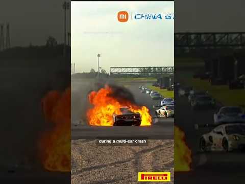 Race car driver saves competitor from burning wreckage