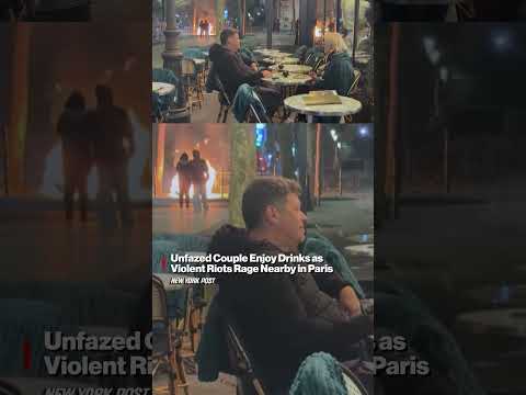 Unfazed Couple Enjoy Drinks as Violent Riots Rage Nearby in Paris #shorts
