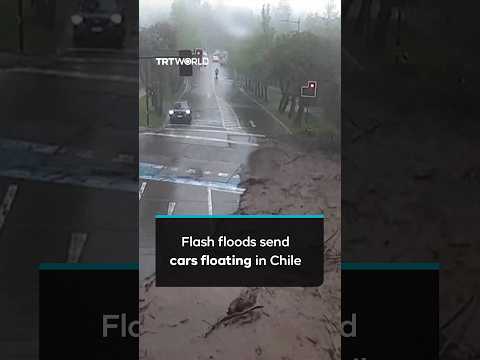 Powerful flash floods drag cars through streets in Chile