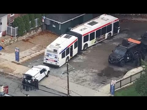 Suspected gunman barricades self on Philadelphia bus after killing 2 women, police say