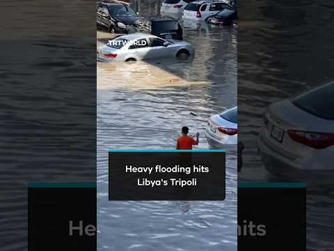 At least one person dead and vehicles submerged as heavy rains flood Tripoli