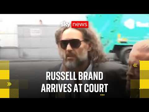 Russell Brand returns to court for start of rape trial
