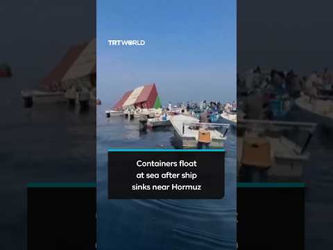 Containers float at sea after ship sinks near Hormuz